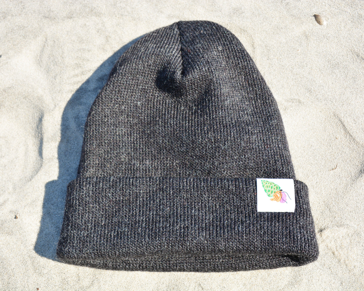 nortons-nest-black-beanie-hat-apparel-clothes-merch-hermit-crab-janie-groeling-pets-pet-supplies-beach-apparel-coastal-clothes