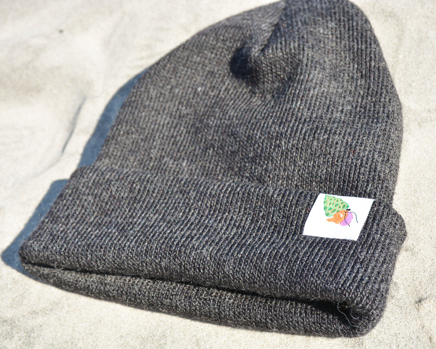 nortons-nest-black-beanie-hat-apparel-clothes-merch-hermit-crab-janie-groeling-pets-pet-supplies-beach-apparel-coastal-clothes