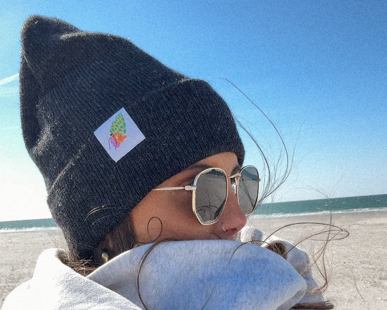 nortons-nest-black-beanie-hat-apparel-clothes-merch-hermit-crab-janie-groeling-pets-pet-supplies-beach-apparel-coastal-clothes